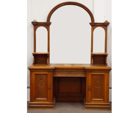 Large late Victorian oak mirror back sideboard, arched mirror back with two bevelled plates either side, reverse break front 
