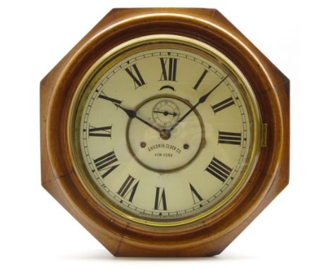 American Ansonia wall clock with enamel dial and seconds ring in octagonal case W43cm