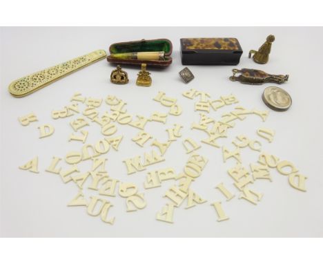 Collection of miniature alphabet letters, Prisoner of War bone knife case, snuff box, 2 fob seals and other items