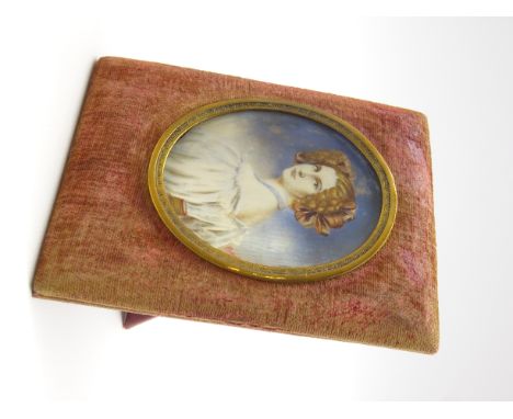 Indistinctly signed miniature oval head and shoulders portrait on ivory of a lady 6cm x 5cm