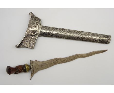 Malayan Kris with engraved and silvered metal scabbard, blade length 29cm  Condition Report &amp; Further Details Click here 