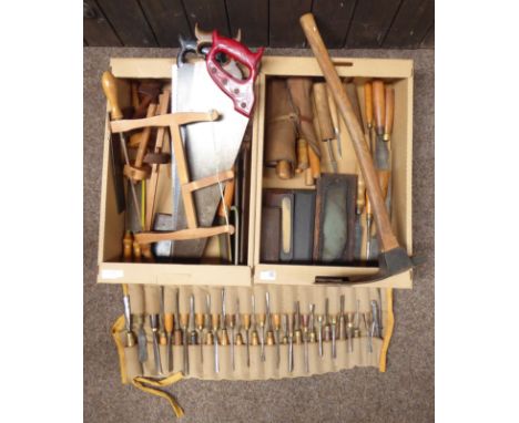 Collection of vintage and later carpentry tools, including cross saws, tenon saws, chisels and sharpening stones L76cm (max) 