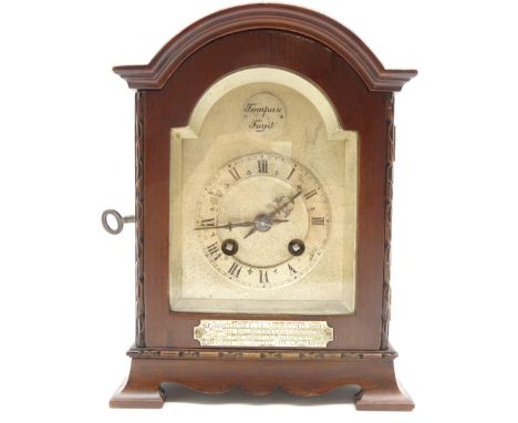 Early 20th century mantel clock with steel dial, French movement and gong strike in domed mahogany case with presentation pla