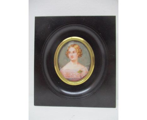 19th century French School - a head and shoulders portrait miniature of a woman with wavy blond hair, wearing a red dress wit