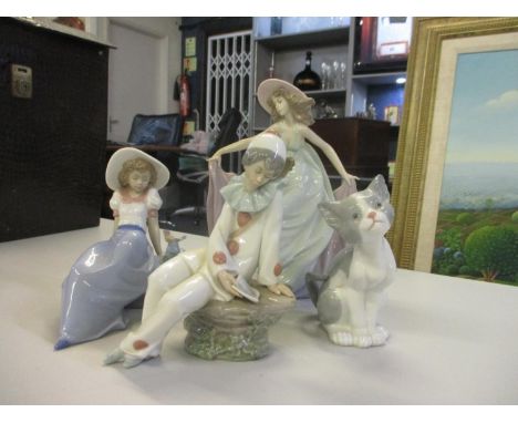 Two Nao and two Lladro figures 