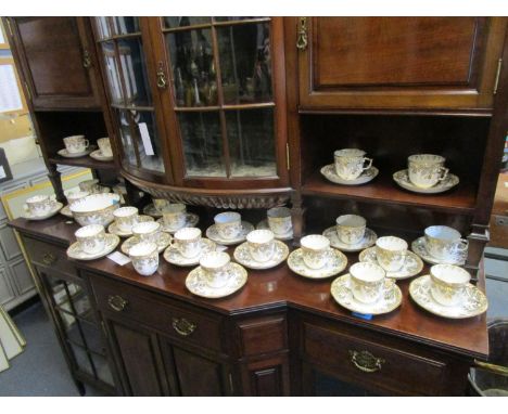 An early Victorian English porcelain part teaset comprising a slop bow, 24 saucers, 17 tea cups and 8 coffee cups 