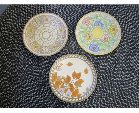 Charlotte Rhead for Crown Ducal and  H J Woods - Three pottery wall chargers comprising a H J Woods Bursley Ware Trellis patt