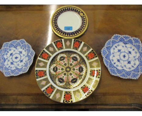 A 1960s Royal Crown Derby Imari plate, two Royal Copenhagen blue and white hexagonal plates with lattice border and a Royal W