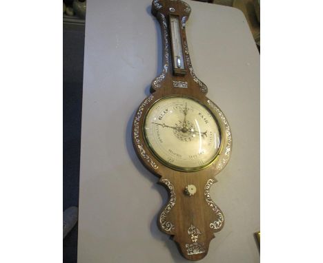 A Silverdale Equitable Industrial Cooperative Society mother of pearl inlaid wall barometer in walnut 