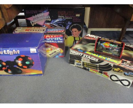 Retro games to include Scalextric Night Stages, boxed, additional Scalextric cars and a disco light 