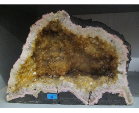 A large clear quartz amethyst geode 14 1/2"h x 20 1/4"w 