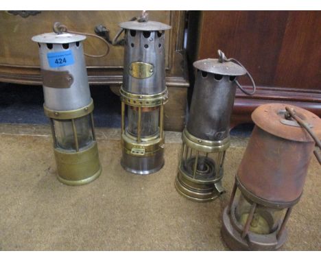 A J H Naylor Ltd, Wigan miners lamp and three others 