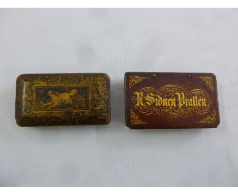 Two early 19th century papier mache rectangular snuff boxes a. gilded image of a dog b. gilded  letters for R. Sidney Prallen