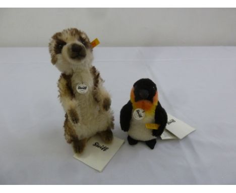 Two Steiff genuine Mohair animals, a Meerkat, Cockie 045257 and a Penguin, Hippie 045677, both with button and label