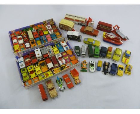 A quantity of Corgi, Dinky and Lesney diecast cars, trucks and buses, all playworn