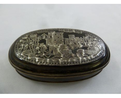 An early 19th century Continental shaped oval tortoiseshell snuff box with inlaid silver decoration to pull-off cover and bas
