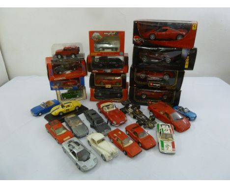 A quantity of large scale diecast cars to include Burago and Maisto, some boxed