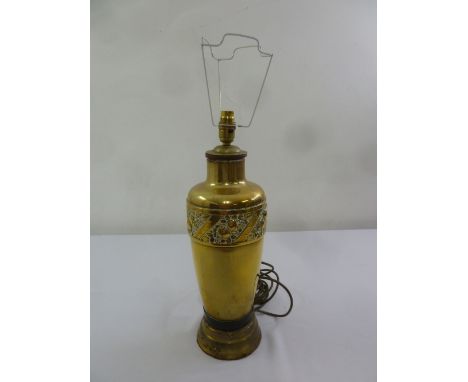 A German brass Art Nouveau style table lamp with raised circular base