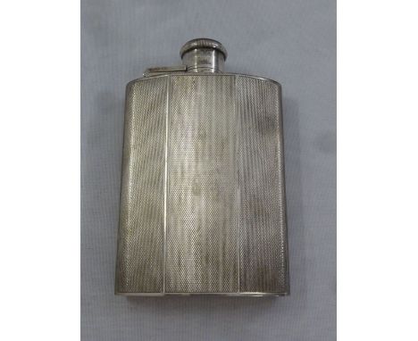 A silver engine turned hip flask, London 1948