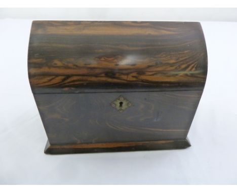 A Victorian lancet form coromandel tea caddy with brass escutcheon