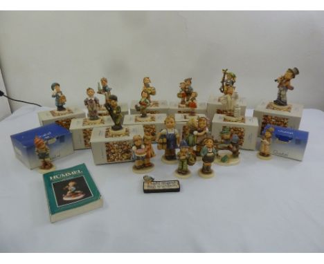 A quantity of Hummel and Goebel figurines of children, most in original packaging  (20)