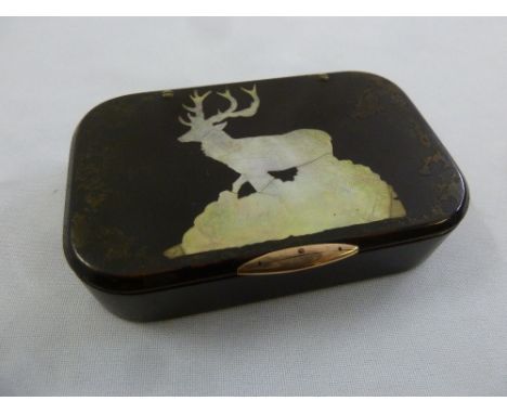 An early 19th century rounded rectangular snuff box with a mother of pearl inlaid stag to hinged cover with gold clasp and in