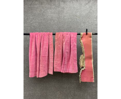 A pair of 20th century bright pink hessian backed velvet curtains with a matched pelmet. L.110 W.85cm (Each curtain) 