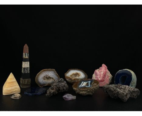 Geology and mineralogy interest; a collection of twelve items to include a whole geode split into two parts along with three 