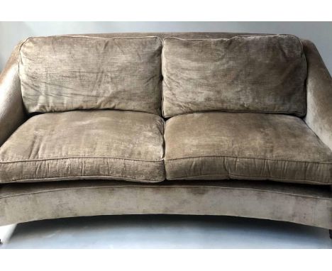 SOFA, concave oyster velvet upholstered with two feather filled back and seat cushions and turned supports with castors, 195c