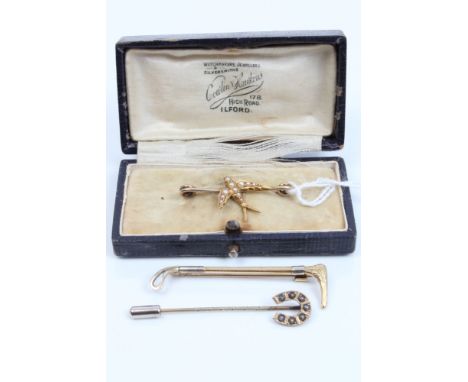 Gold riding crop brooch / stick pin, Victorian seed pearl swallow brooch and a horseshoe stick pin (3)