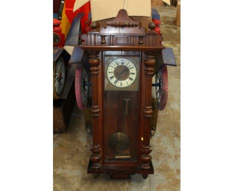 Late 19th century Vienna regulator-style wall clock with enamelled dial, twin weights and pendulum in walnut glazed case with