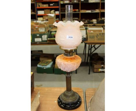 Victorian oil lamp with pink glass reservoir and shade, reeded column    CONDITION REPORT  No chips or cracks to font, there 