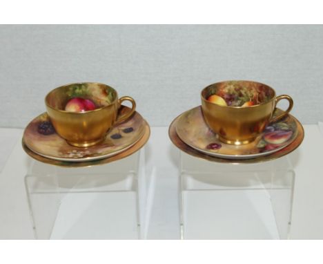 Pair of Royal Worcester Cabinet Trios - comprising cups, saucers and tea plates with hand-painted fruit decoration, each piec