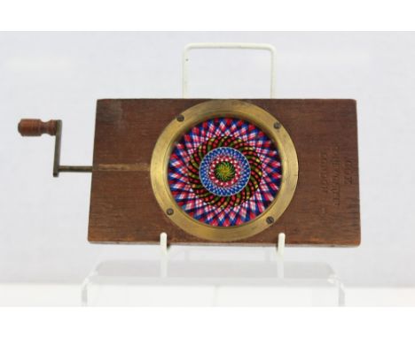 Mechanical chromotrope magic lantern slide by Cox of London