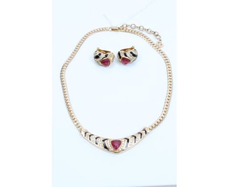 1980s Christian Dior gilt metal necklace with central red stone and chevron design, together with pair matching clip-on earri