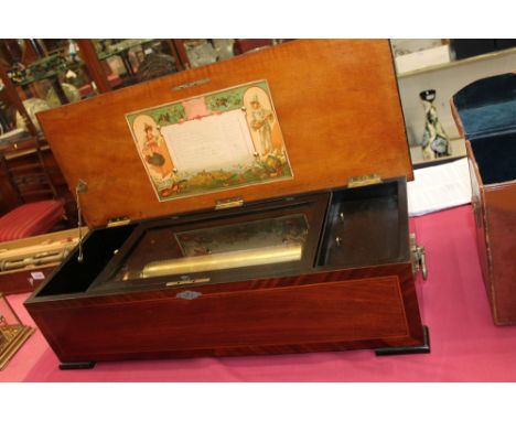 Good large late 19th / early 20th Century Swiss music box playing twelve airs, with original label to underside of lid, in ro