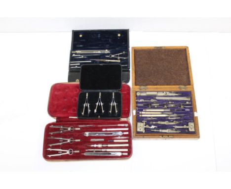Four cased sets of late 19th / early 20th century draughtsman's tools