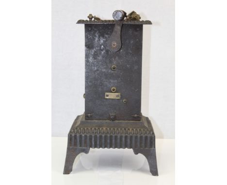 19th century cast iron mechanical spit - black leaded case, on bracket feet, housing clockwork mechanism, 38cm high.  Provena