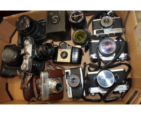 Quantity of cameras and related accessories - comprising three 35mm Canon SLRs, Canon lenses and extension tubes, two Olympus