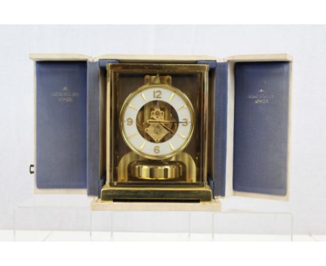 1960s Atmos clock calibre 526-5, with 12cm white circular dial and gilt brass case.  Serial no. 147358, with original storage