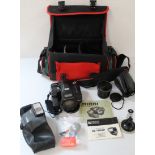 Camera bag containing Richo Mirri camera with manuals, Teleconvertor TC -200M in soft case, camera