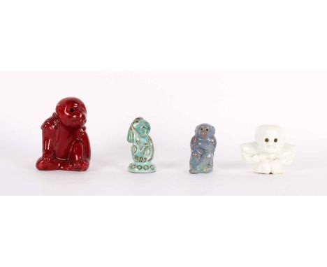 Bernard Moore (British 1850-1935) Three Art Pottery Figures and Another Early 20th century, comprising two monkeys in flambe 