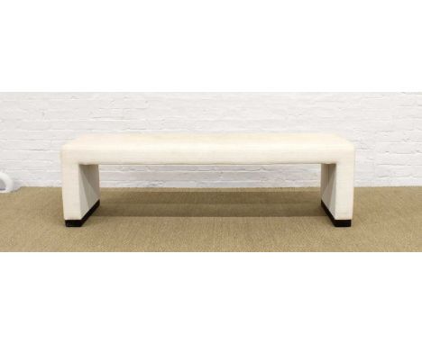 Long Upholstered Bench Late 20th century, formerly in a Bond St. showroom, cream upholstery on ebonised supports.160cm long, 