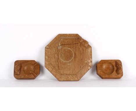 Workshop of Robert "Mouseman" Thompson, Kilburn Octagonal Oak Cheeseboard & Pair of Ashtrays Circa 1950s/60s, all bearing car