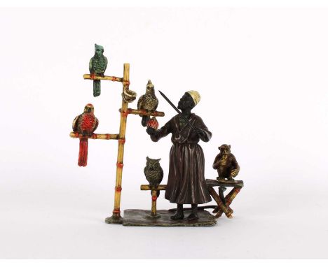 "The Parrot Trainer" Cold-Painted Bronze Figure Group After Franz Bergman Modelled after the original design, bearing tamped 