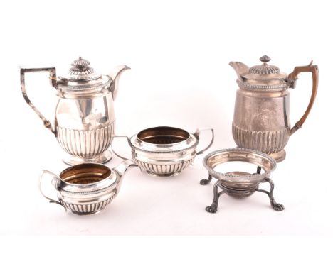 A George III silver teapot, hallmarked for London 1818 by&nbsp;Robert Hennell, 21cm height, a silver bowl and milk jug, both&