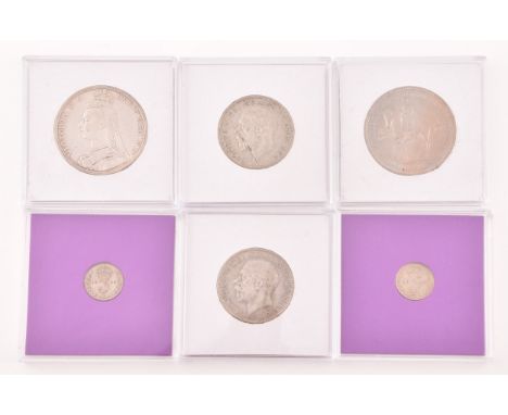 A collection of silver coins including a Queen Victoria 1892 crown, two 1936 half crowns, 1920 and 1925 threepenny pieces, an