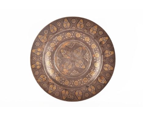 A 19th century North Indian bronze gold and silver-inlaid koftgari dish, decoration consists of golden rosettes amidst silver