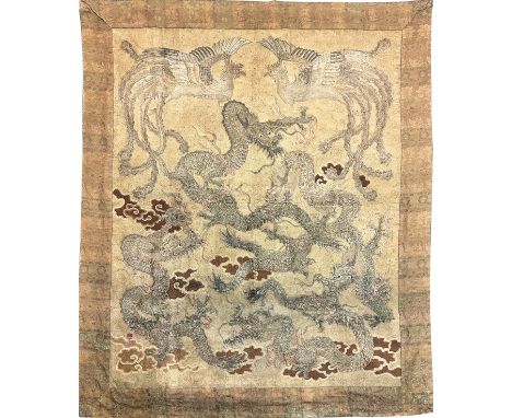 A large antique Chinese silk needlework tapestry wall hanging,&nbsp;decorated with give dragons chasing a flaming pearl amist