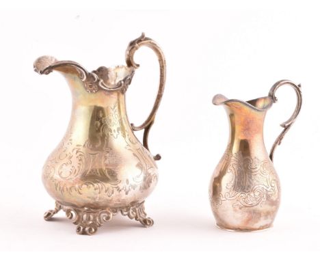 Two Victorian silver jugs, one hallmarked for London 1848 by George John Richards, 15.5cm tall, the other for London 1851 by 